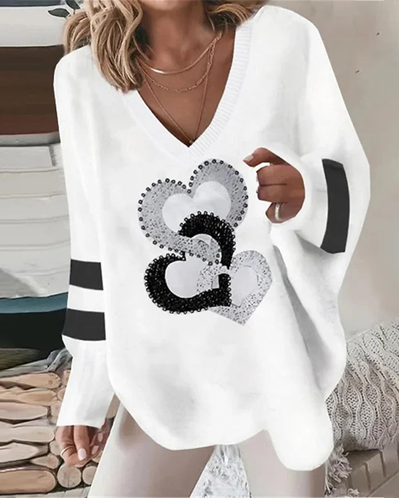 Laluna® | Zomerse top met lange mouwen en hartjesprint