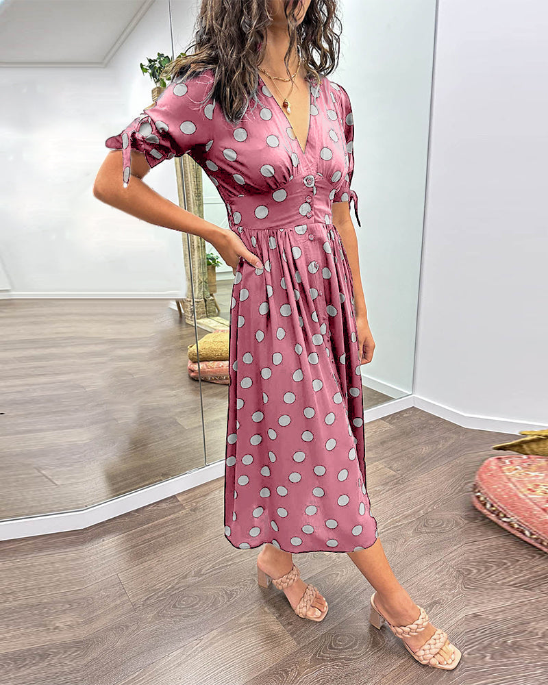 Jurk met diepe V-hals en stippen