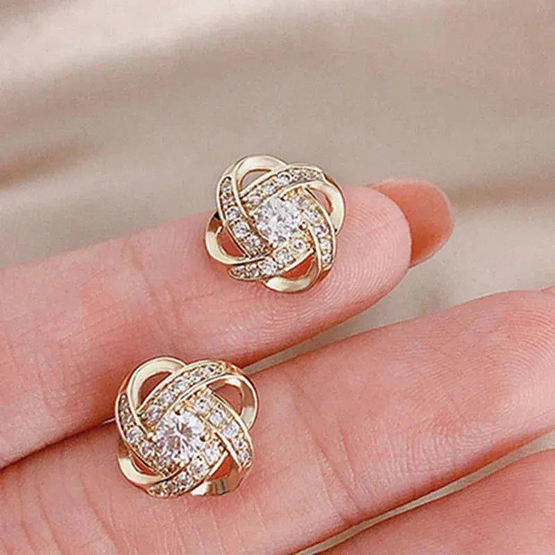 Gouden spiralen oorbellen met kristallen